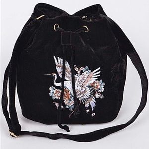 Black Velvet crane bag with floral design